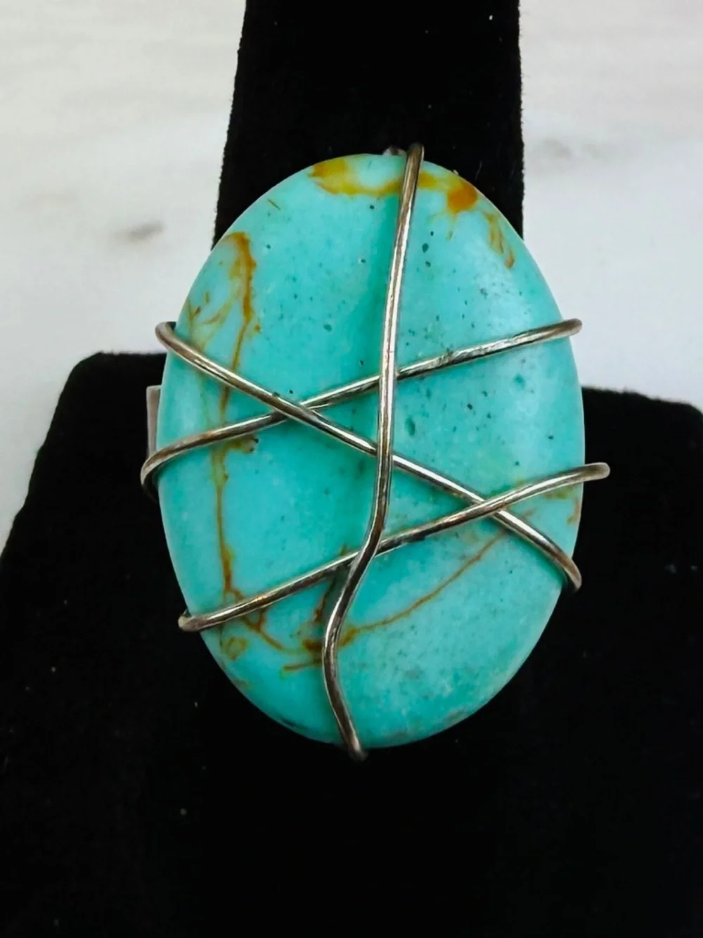 Aged silvertone, wire wrapped blue center size 6 adjustable costume ring